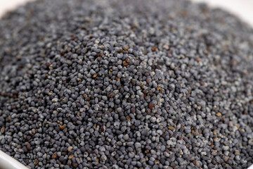 A large number of poppy seeds on the cooking table