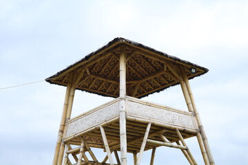 lifeguard stand with sky in the background