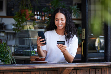 Woman, phone and credit card with smile for ecommerce, online shopping or purchase at coffee shop. Happy female customer on smartphone for internet banking, app or wireless transaction at cafe - obrazy, fototapety, plakaty