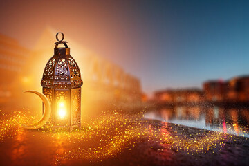 Ornamental Arabic lantern with burning candle glowing . Festive greeting card, invitation for Muslim holy month Ramadan Kareem. Ramadan Kareem greeting photo with serene mosque background.
 - obrazy, fototapety, plakaty