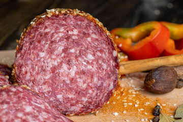 Sliced sausage with spices and lots of sesame seeds