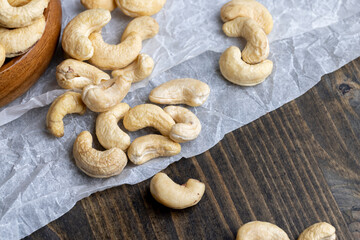 Fresh peeled cashew nuts on the table
