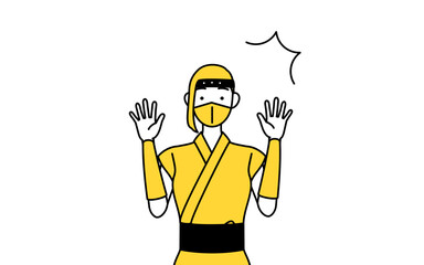 驚いて手を上げる忍者のコスプレをした女性