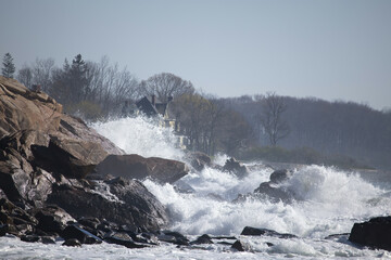 Ocean waves crashing on a rocky shore