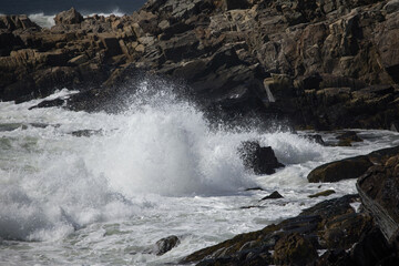Ocean waves crashing on a rocky shore