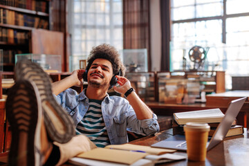 Student stream music in library.