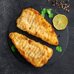 cod fried fish in batter delicious seafood healthy meal food snack on the table copy space food...
