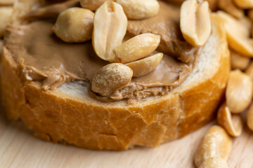 Peanut paste on a soft wheat baguette