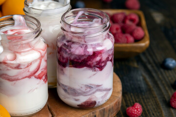 Fresh delicious yogurt made from milk with berry flavor