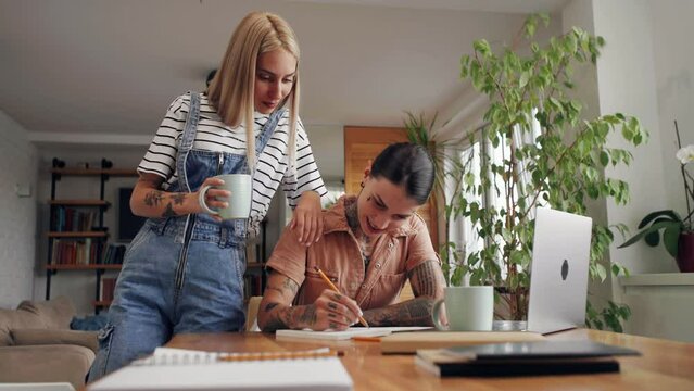 Two students preparing masters degree