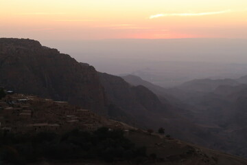 Fototapeta na wymiar The village of Dana and the Dana Valley next to it after sunset, Dana, Jordan