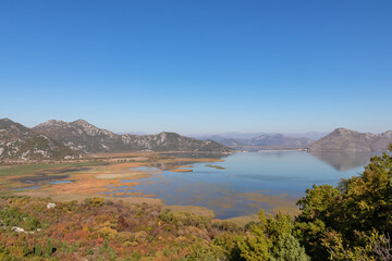 Panoramic view of Lake Skadar National Park in autumn seen from Virpazar, Bar, Montenegro, Balkans, Europe. Travel destination in Dinaric Alps near the Albanian border. Stunning landscape and nature