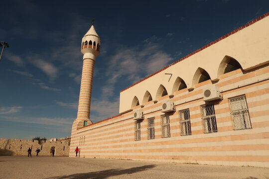 Kids playing in front of Haj Hamdi Mosque Alanis in As-Salt, Salt, Jordan
