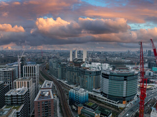 Aerial London Skyline view near railway road. Transportation logistics through London.