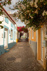 Colorful and flowery streets of the village of Ferragudo, Algarve, Portugal