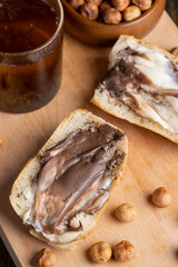 slices of bread with chocolate butter on the table