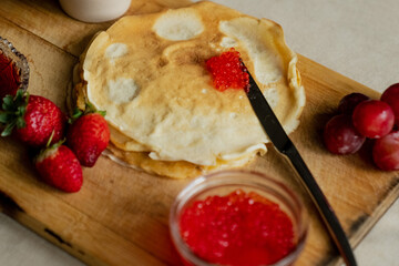Pancakes with red caviar, breakfast
