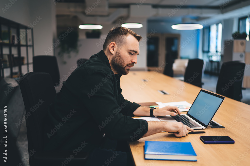 Poster busy freelancer working in office on computer with copy space