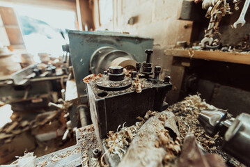 Close-up photo of a lathe working on wood. Mechanical processing of wood