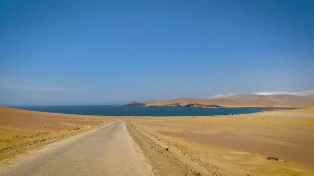 Riding through Paracas National Reserve in Peru. Off road experience.