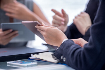 secretary present a document to boss to reading. coworker explain statistics, Hand finger point to drawing graph presentation explaining new idea for business improvement to teamwork.