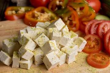sliced white cottage cheese with spices