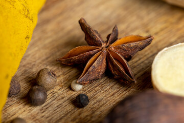 Different types of spices scattered on the table during cooking