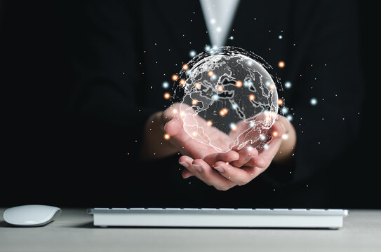 businessman holding Global network connection. Big data analytics and business intelligence concept. World map point and line composition concept of global business. Digital link tech.