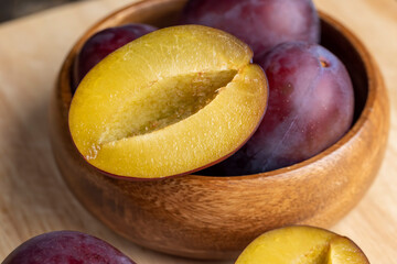 Ripe plums cut into pieces during cooking