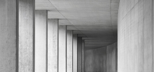 empty dark abstract gray concrete underpass with side light