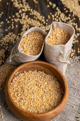 Fresh wheat porridge in a linen bag