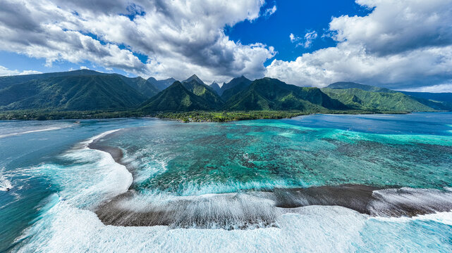 Aerial of Teahupoo wave and Tahiti Iti, Society Islands, French Polynesia, South Pacific, Pacific