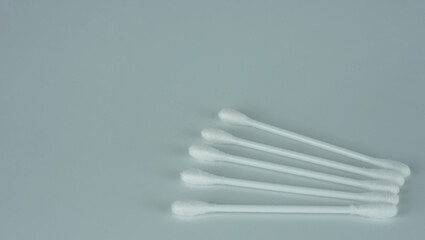 White cotton swabs isolated on gray background,cotton buds