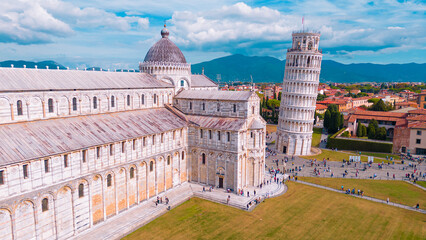Fototapeta na wymiar Aerial image of the Italian city of Pisa's Santa Maria Assunta complex, which includes the Tower of Pisa.