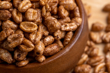Airy wheat covered with a thin layer of cocoa chocolate