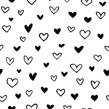 Vector seamless pattern with drawn hearts. Cute design for fabric, wrapping, wallpaper for Valentine's Day.
