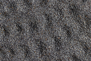 Poppy seeds on the table close up