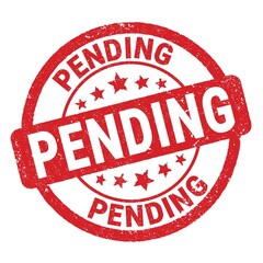 PENDING text written on red round stamp sign.