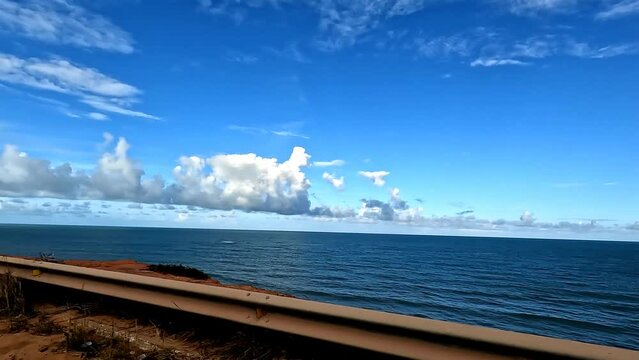 Sea horizon seen from a road on a cliff. Holiday landscape.