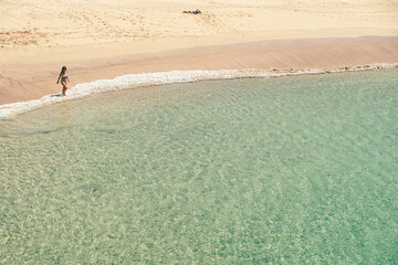 Fototapeta na wymiar Fuerteventura Spain. September 14, 2022. Tourists on the Cofete beach in Fuerteventura