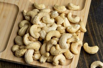 Fresh peeled cashew nuts on the table