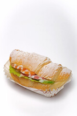 Stuffed croissant on a white background