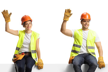 Male and female builders sitting on a panel and waving