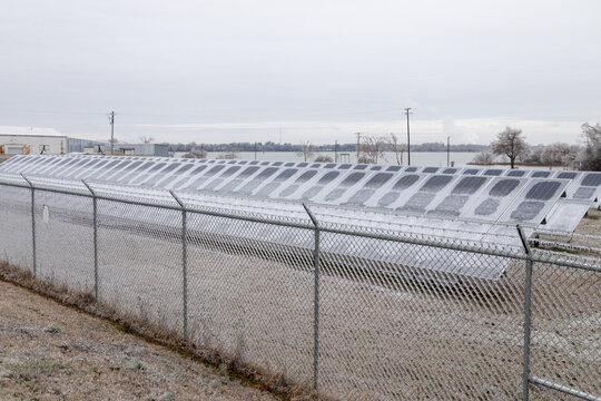 Ice covered solar panels climate change