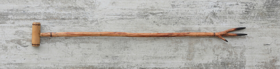 sharp wooden walking stick isolated