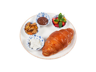 Breakfast plate on isolated white background. Croissant