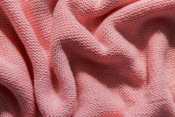 Fototapeta na wymiar pink yarn,Texture of knitted woolen pink cloth. Winter sweater background,Blanket,Crochet,Knitting Needle,Luxury,Pastel Colored, Artificial,Backgrounds,