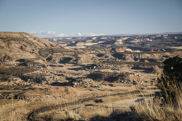 Landscape shot of colorful desert landscape in western colorado of rocky hills canyons mesas and buttes
