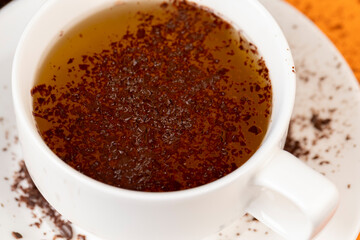 hot tea brewed in a white mug