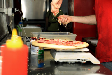chef preparing pizza